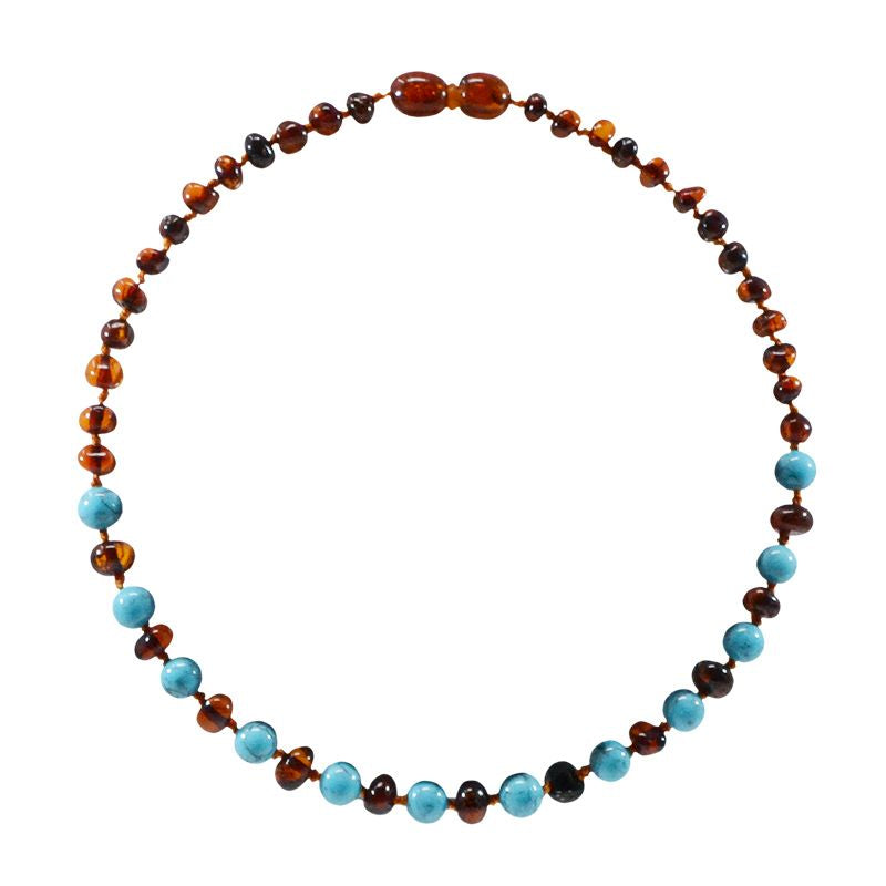 IRRÉVERSIBLE Bernstein-Babykette und Naturstein 32cm