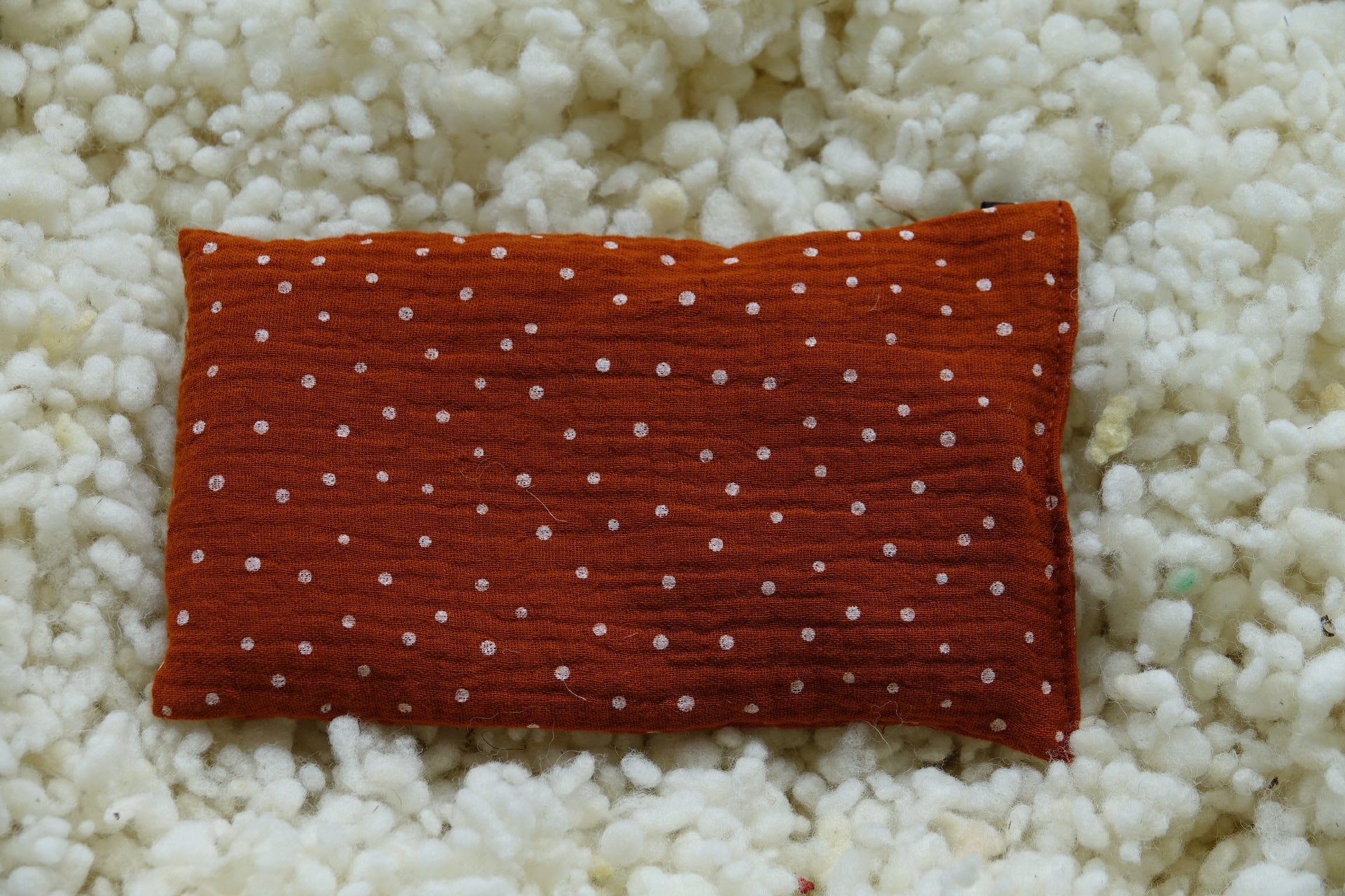 Wollreich Erdbeerkernkissen